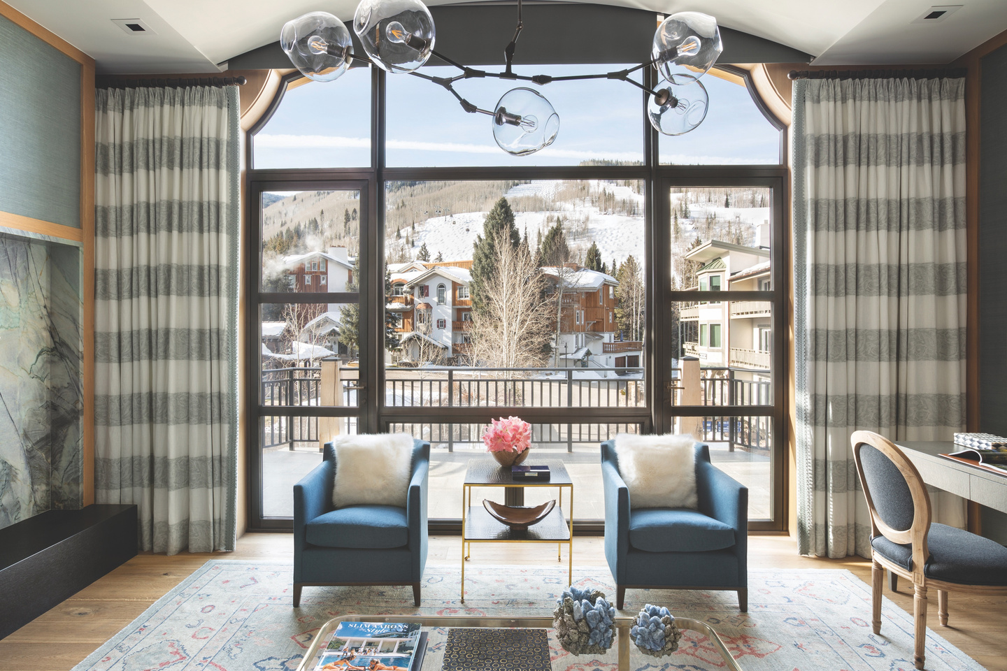 Room with mountain and ski view