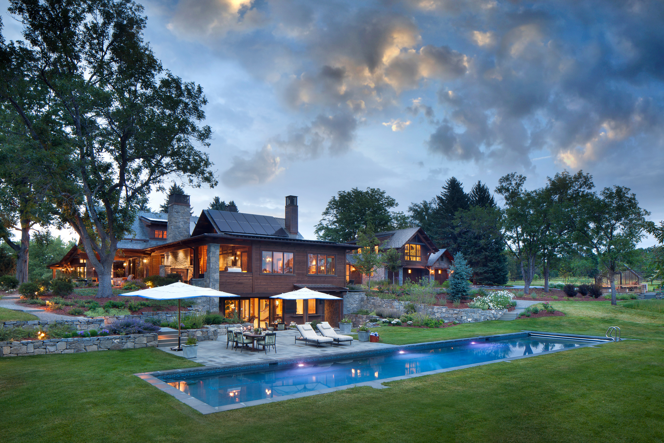 Estate with pool at dusk