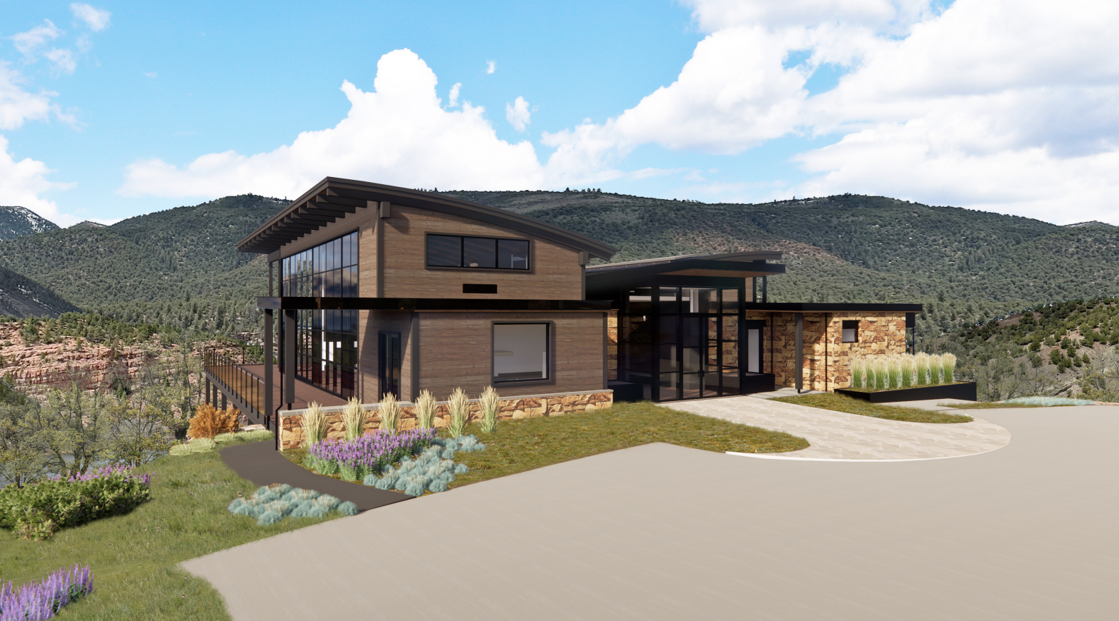 Modern mountain home front exterior with driveway